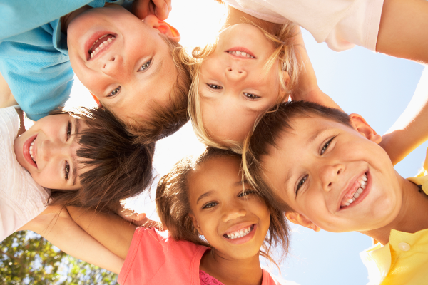 Children with Arms Around Eachother in Circle