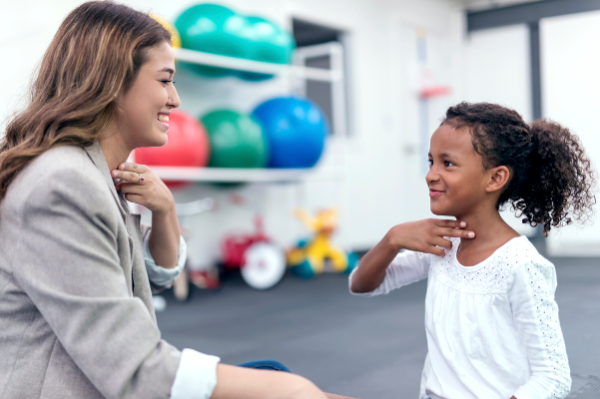 Child practicing speech exercises